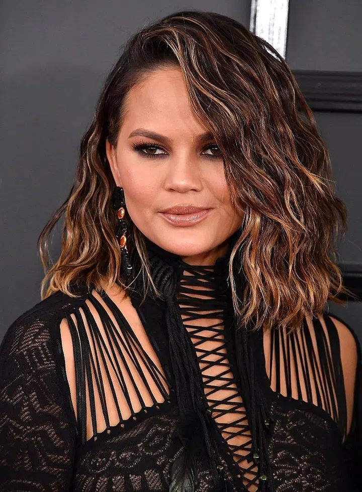 Makeup up artist, Patrick Ta used exclusively Sephora Collection products on Chrissy. Her glossy nude lips are a mixture of Sephora Collection Lip Stain in "Pink Late" and "Copper Blush", topped off with their Colourful Gloss Balm in "Balm" for shine. Photo: Getty
