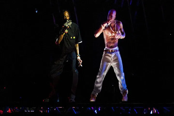 One of the most controversial performances in Coachella history came in 2012 when Dr. Dre and Snoop Dogg brought out a hologram of Tupac to spit "Hail Mary" and "2 of Amerikaz Most Wanted." Billboard reported that "the crowd had no idea what to do with the hologram," and noted the particularly bizarre nature of having the recreation shout "What the fuck is up, Coachella!" considering Tupac died before Coachella was even born.

Photo: Getty
