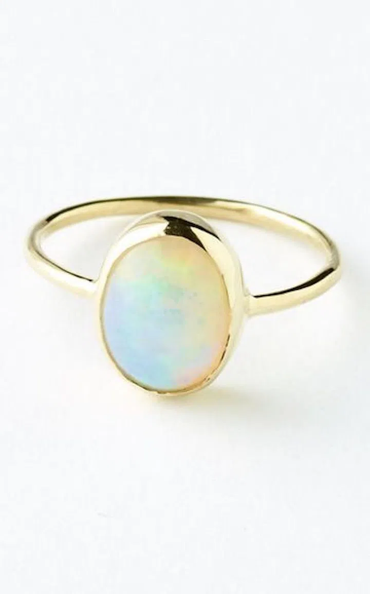 14kt gold ring with opal, $435, oliviakane.co.
