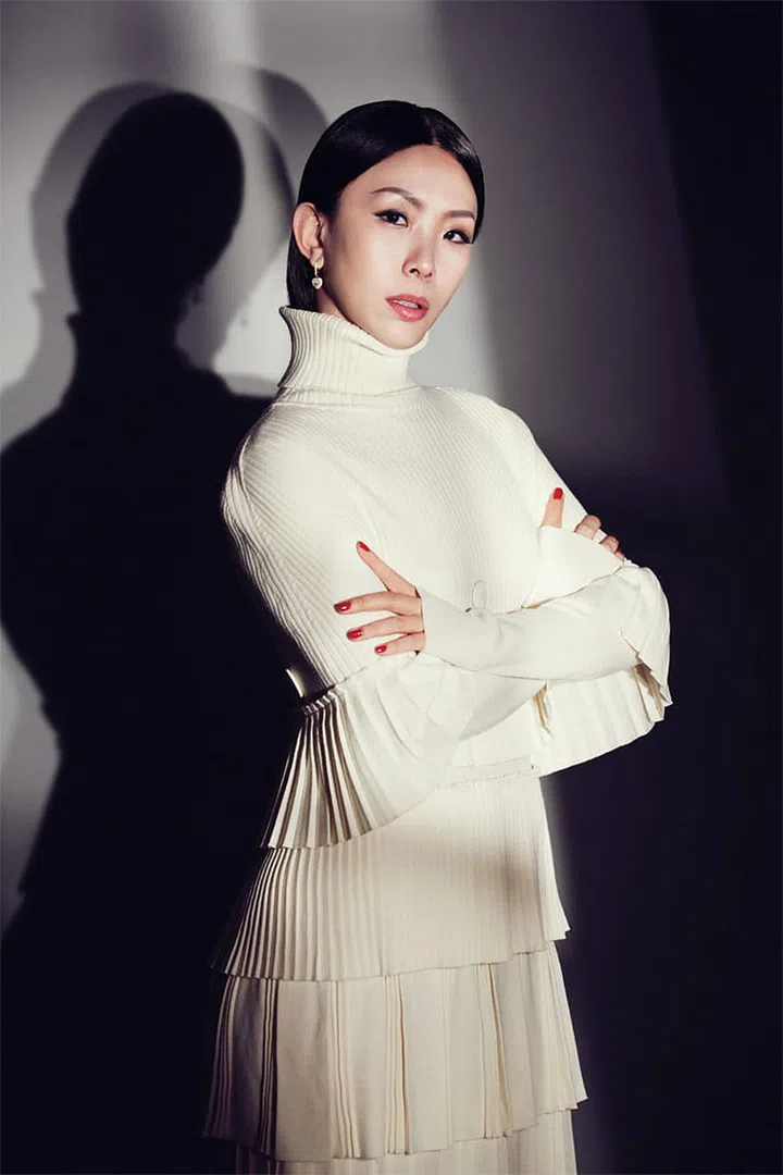 Cape; dress, Salvatore Ferragamo. Earrings, May-Han’s own
