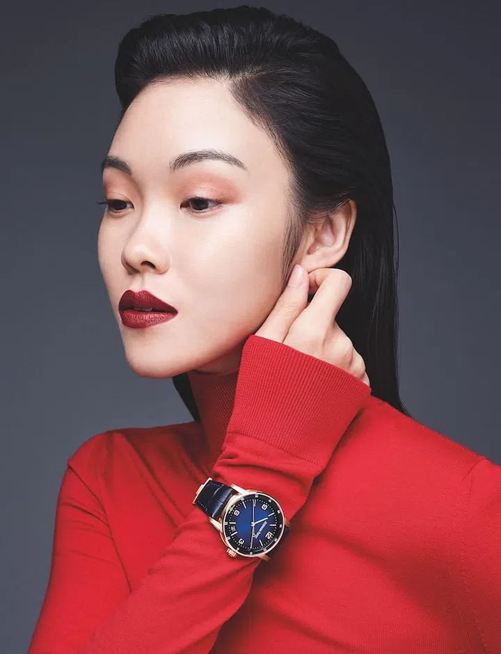 ink gold CODE 11.59 by Audemars Piguet Selfwinding watch. Sweater, by Givenchy 
