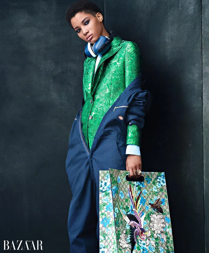 Gucci jacket, shirt, rings, and bag; Dickies jumpsuit.