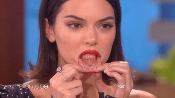 Jenner showing her tattoo on DeGeneres’ show.
Photo: EllenTube