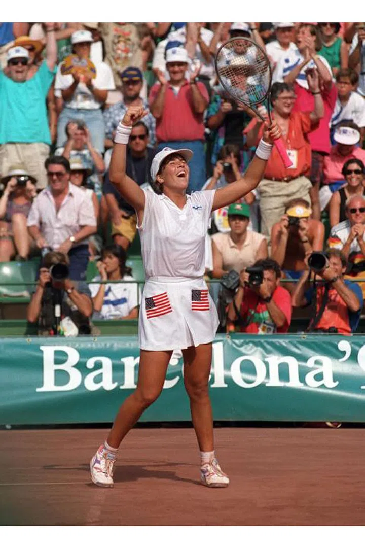 American tennis player Jennifer Capriati celebrates a win against German player Steffi Graf in the women's final at the Olympics in Barcelona. Photo: Getty
