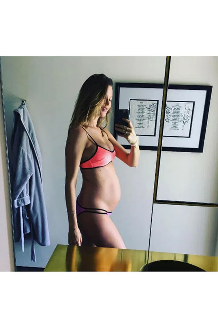 At the end of April 2016, the Namibian model posted a mirror selfie of her first bump. Her caption? Baby chick emoji, naturally. Photo: Behati Prinsloo