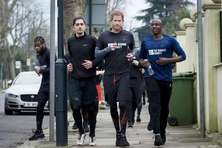 Prince Harry runs with staff and users of The Running Charity, a program for homeless and vulnerable youth in Willesden, North West London, England.

Photo: Getty