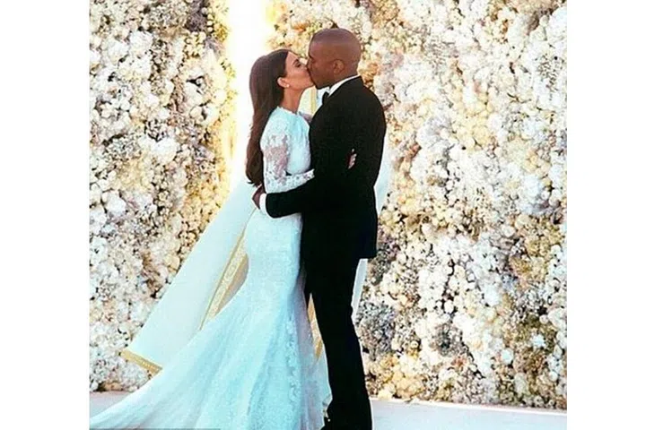 Would you expect anything less than a $400,000 custom-made Givenchy gown from Mrs Kardashian West?
