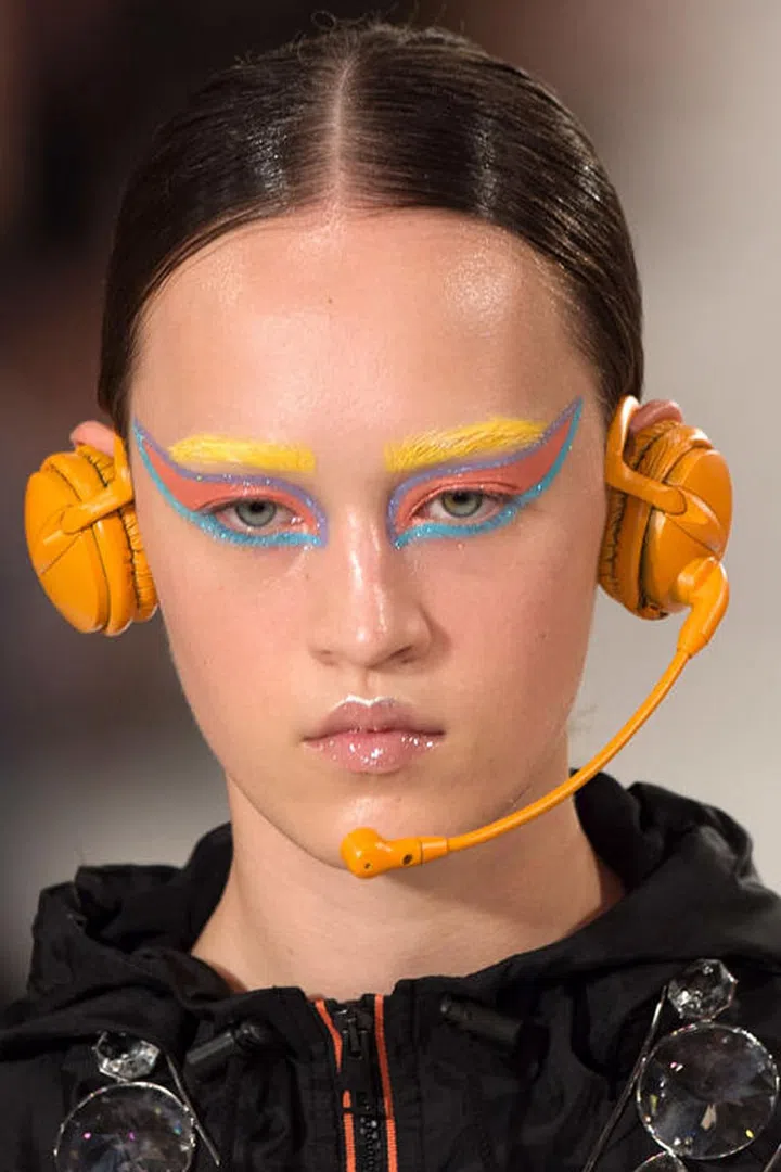 An out-there, but so very colorful, eye makeup look backstage at Maison Martin Margiela.