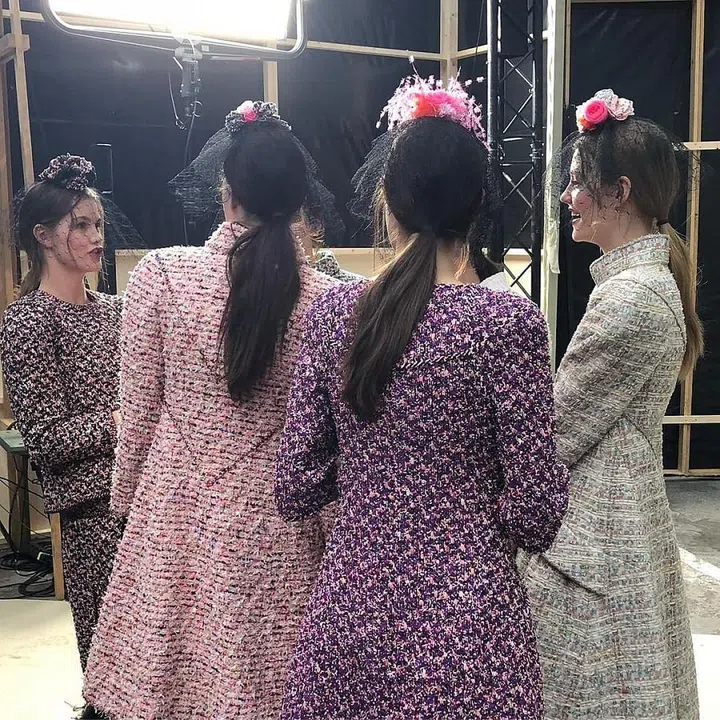 Hairstylist Sam McKnight is no stranger to bringing the humble ponytail into couture territory. To get the shape seen here, secure hair with an elastic and then mist the ends with a lightweight texture mist to add body and movement.