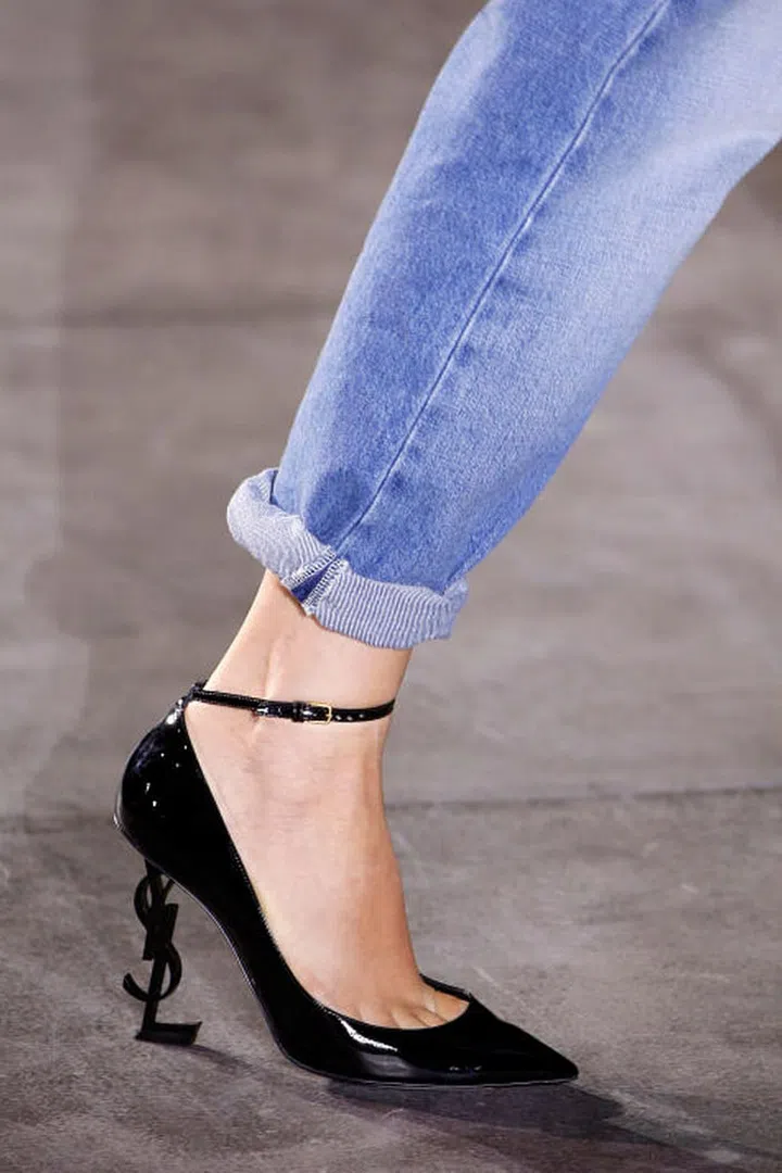 Anthony Vaccarello made his first outing for Saint Laurent this season, reviving the label's iconic logo - which made up a ornate heel. We want.