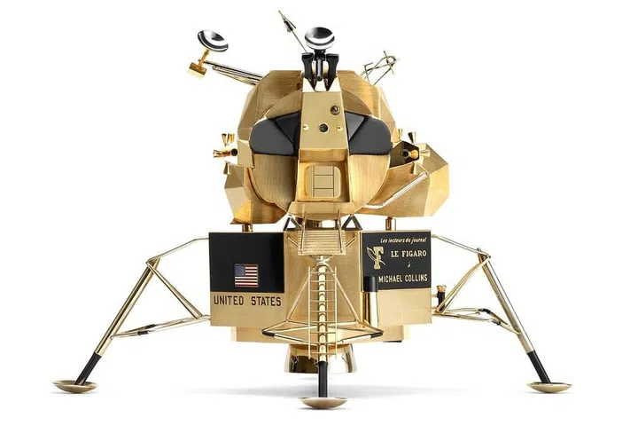 Cartier Paris, 1969 — Gold, black lacquer and enamel. Engraved writing translates as: "From readers of Le Figaro newspaper to Michael Collins". Cartier Paris was commissioned by Le Figaro newspaper to make three scale models of the LEM, which were presented to three astronauts when they visited Paris. Figaro readers, who financed the project through a subscription drive, thereby participated in the event of the century. Each module contains a microfilm bearing the names of the subscribers who contributed to the operation. Cartier Collection. Photo: Cartier
