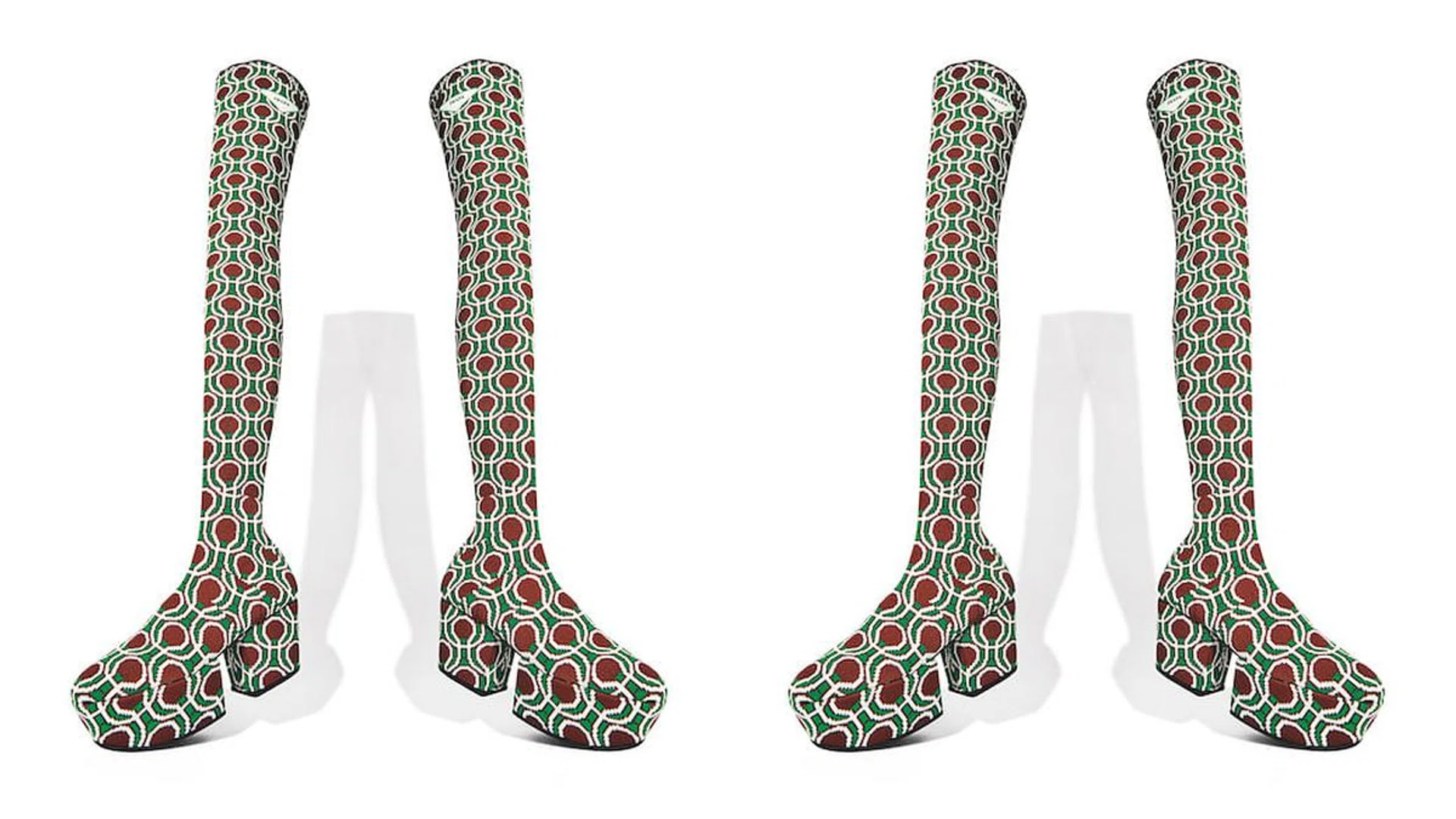 Miuccia Prada And Raf Simons Scale Great Heights With The Boots Of The Season