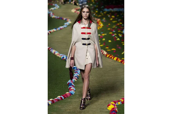 In a collection that cribbed liberally from the pantheon of British rock royalty, Tommy Hilfiger added in sparkling booties and a teeny tiny boyish onesie. ; Photo: Imaxtree