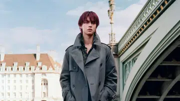 Bright Vachirawit in Burberry trench coat in London