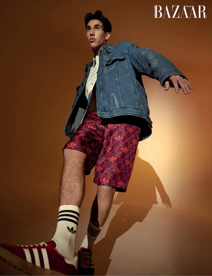 Mahler wears jacket, from Fendi; shirt, from Louis Vuitton; shorts and sneakers, both from adidas x Gucci. Socks, stylist’s own. (Photo:  Phyllicia Wang)