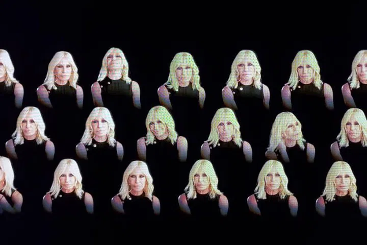 Donatella Versace greeted the guests and took her bow after the show through the giant LED screen.