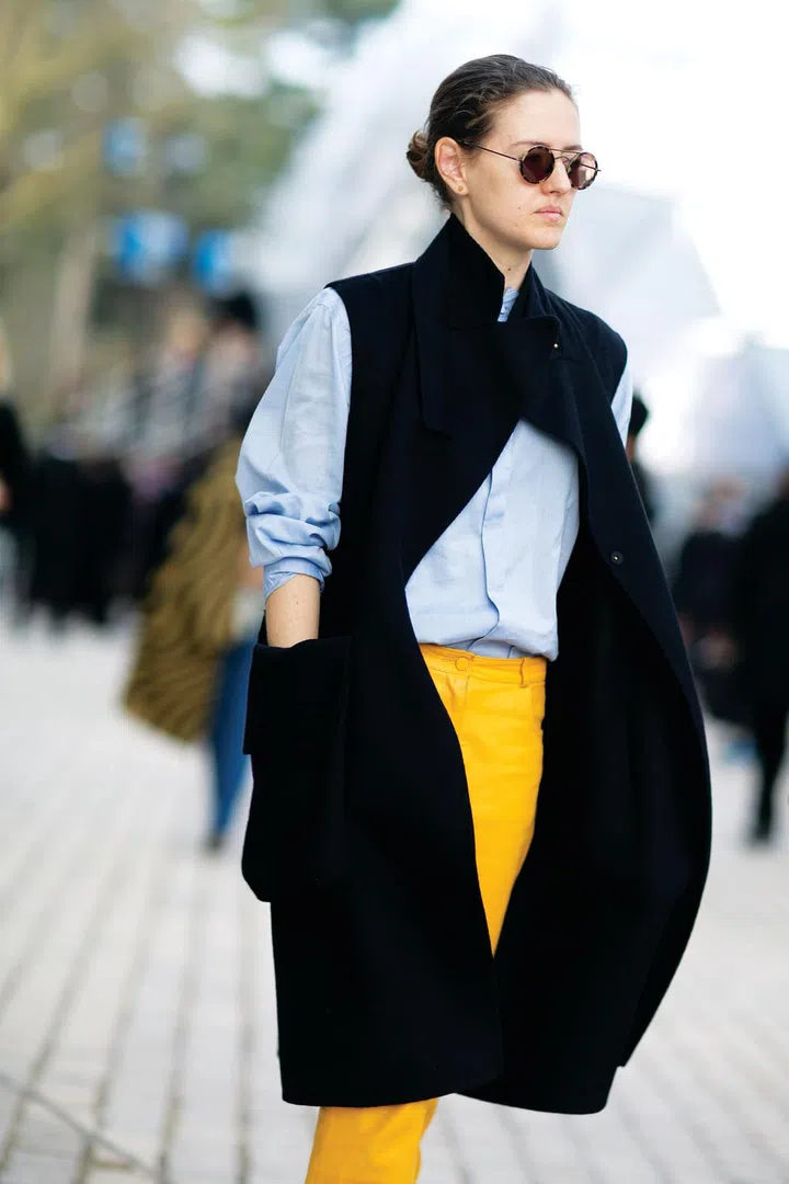 Cut a figure of cool with a masculine sleeveless coat 