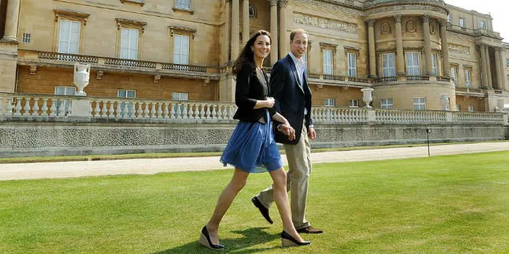 The newlyweds are wisked away from Buckingham Palace via helicopter on Saturday morning.

Photo: Getty