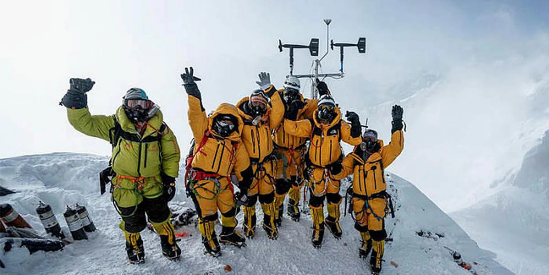 Members of the multidisciplinary team pose for a portrait after successfully installing weather stations on Mt Everest. <br />Photo: Courtesy of the National Geographic Society