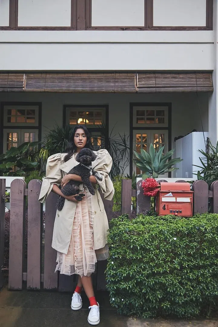 Coat; top; skirt, Simone Rocha x H&M. Sneakers, CELINE by Hedi Slimane. Socks, stylist’s own. (Photo: Phyllicia Wang)