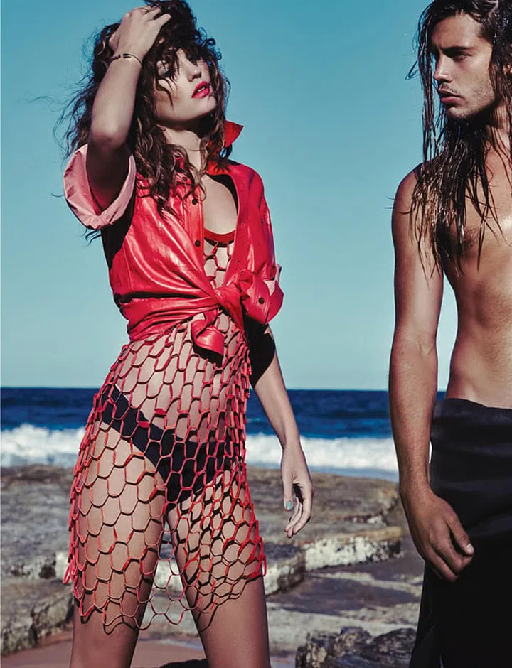 Leather shirt; leather net dress. Lycra bikini bottom, Eres. Gold Diva bangle, Bulgari