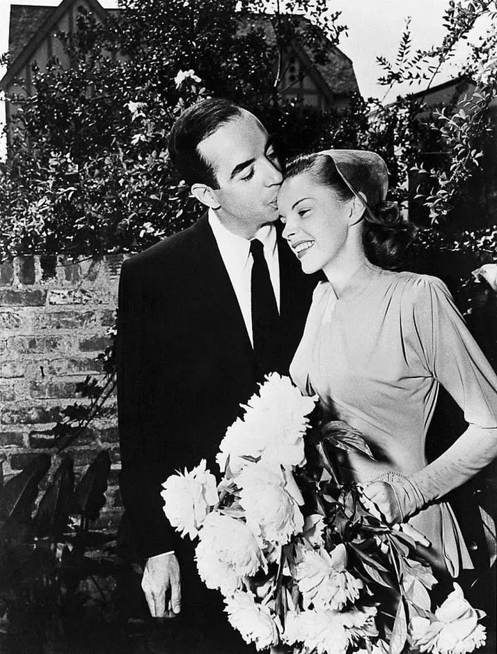 Marrying Vincente Minneli in 1945. The high collar says "I'm modest!" but the Instagram you'll post of this will say "I want somebody to give me forehead kisses."