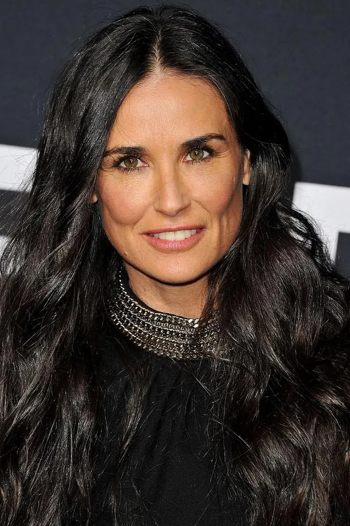 Jet-black colour adds an edgy factor to long length. Photo: Getty