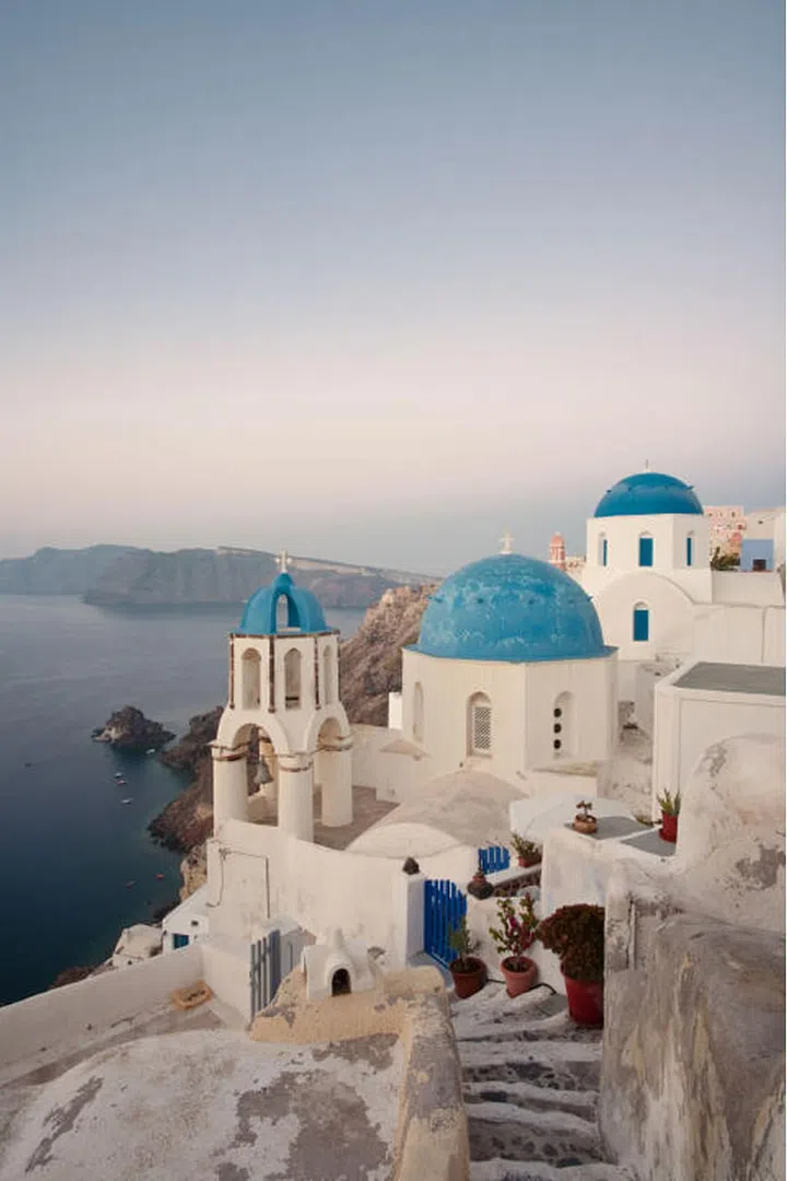 All of the Greek islands are undeniably beautiful, but head to the hillside town of Oia for some of the best views of the bright blue Aegean Sea. Photo Getty/Berlin Harald Braun.

