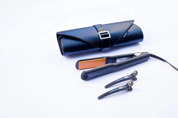 Each GlamPalm styler comes with a sleek case and hair separators.