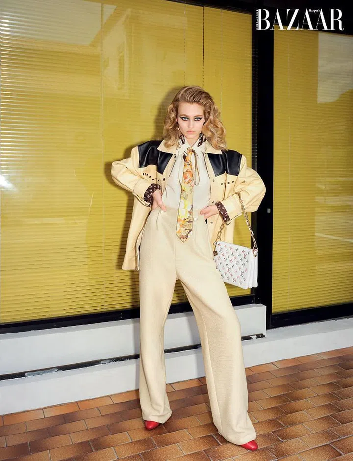 Jacket; shirt; trousers; tie; Coussin bag; boots, Louis Vuitton.

Photo: Stefan Khoo