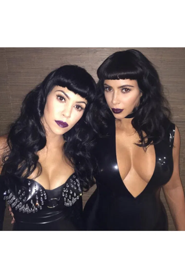 Kim and Kourtney posted photos of themselves in matching bangs a few months ago, but turns out they were just accessories for the Kardashians' vampy photoshoot organized by Kim. (Side note: do you and your family dress up for professional shoots together?)
