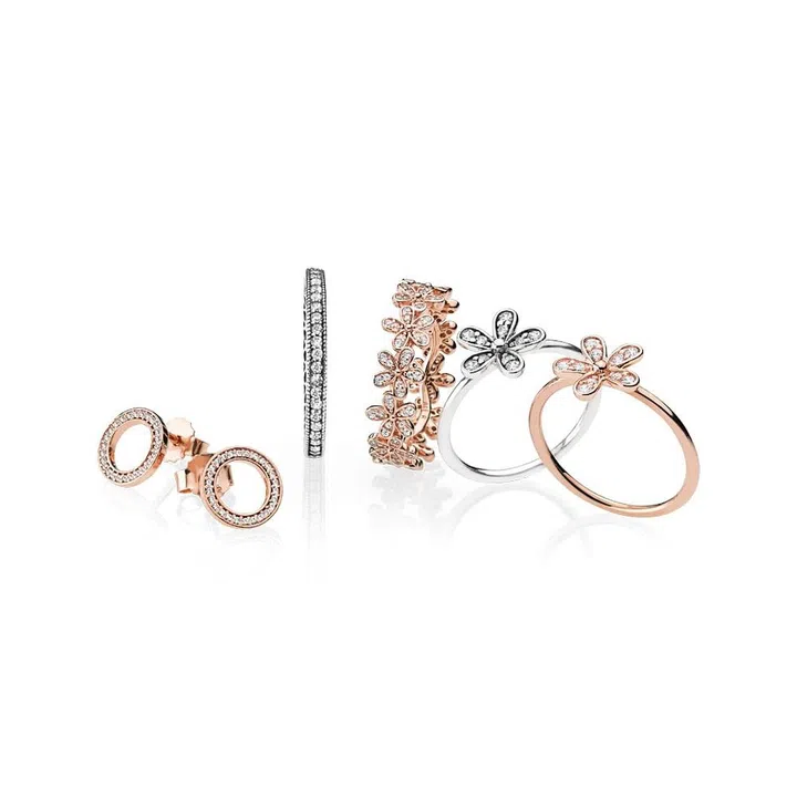 (From left) Forever PANDORA Stud earrings, $99; Hearts of PANDORA ring, $99; Dazzling Daisy band ring, $179; Dazzling Daisy ring, $99