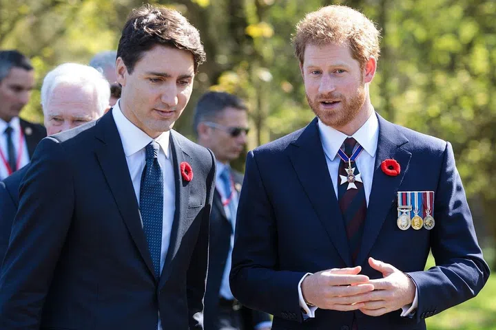 Canadian Prime Minister Justin Trudeau and Prince Harry, 32, converse at the commemorative service at the Canadian National Vimy Memorial.