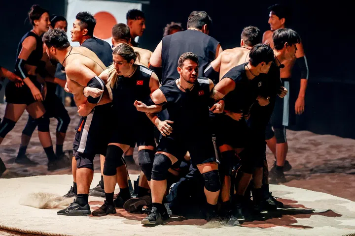 Netflix still: Physical: Asia. Turkish wrestler Yasemin Adar Yiğit (second from left) in Physical: Asia. 