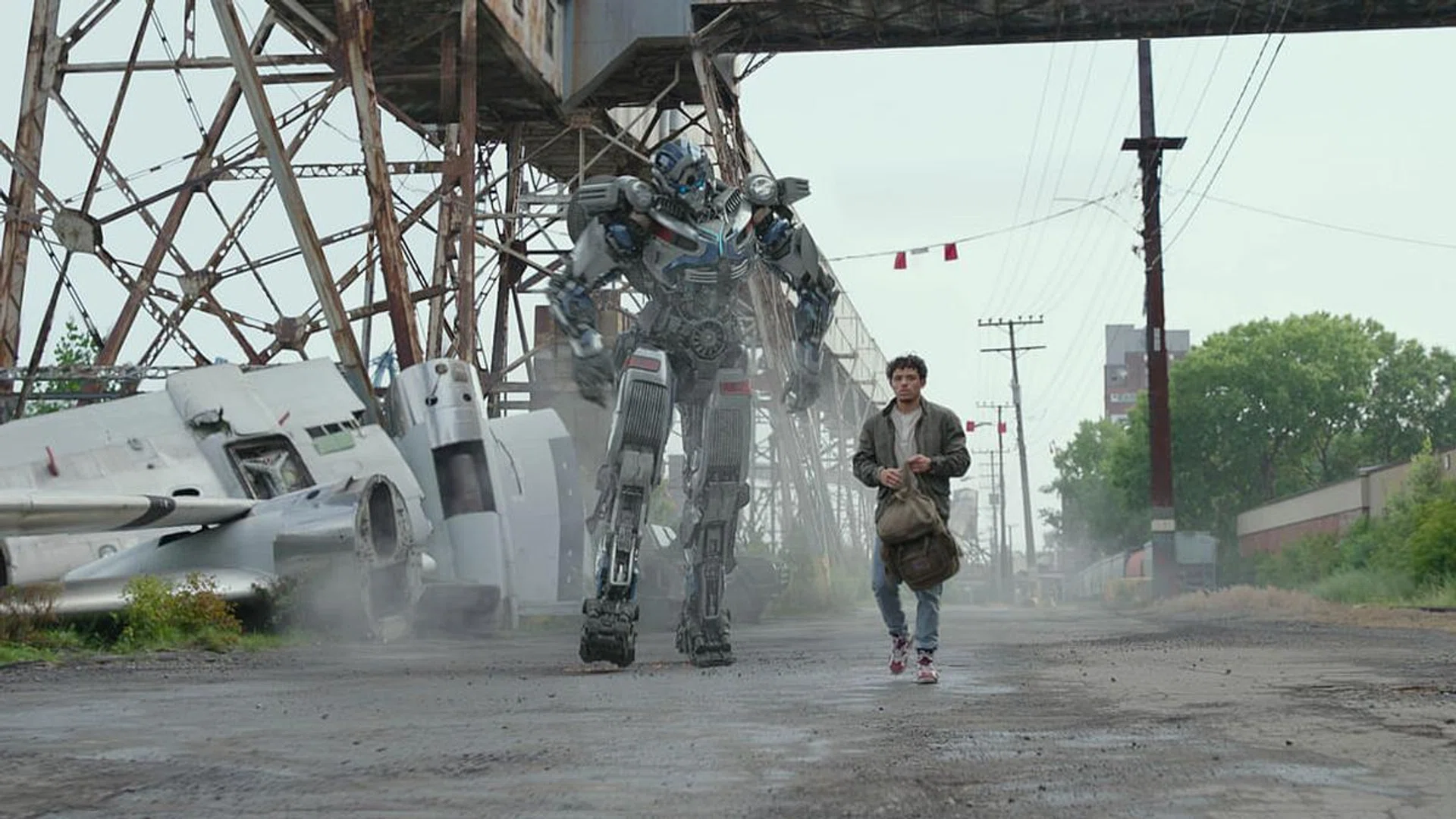 Mirage (voiced by Pete Davidson) with Noah Diaz (Anthony Ramos)