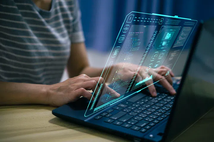 Analyst working with Business Analytics and Data Management System on computer, make a report with KPI and metrics connected to database. Corporate strategy for finance, operations, sales, marketing.