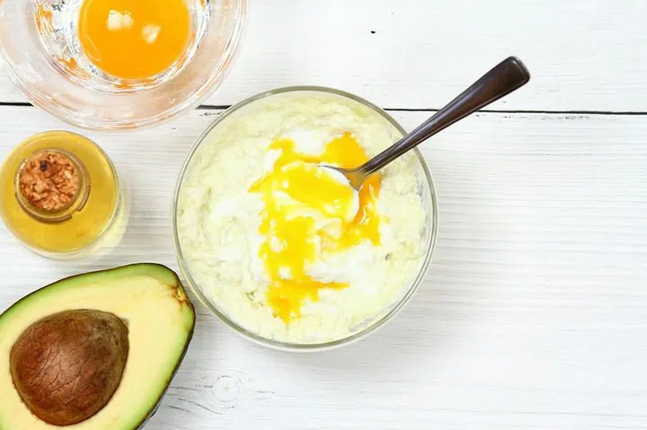 Avocado, olive oil, yogurt and egg yolk for hair mask.  Natural ingredients for  smoothening, softening and hydrating  your hair