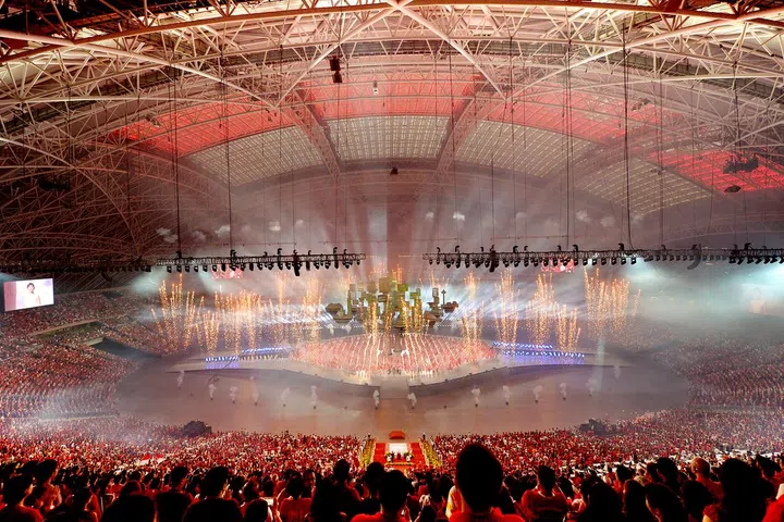 The doom roof of the National Stadium lighting up with the Singapore flag during a preview of the National Day Parade on 30 July 2016. [NDP 2016 ]  