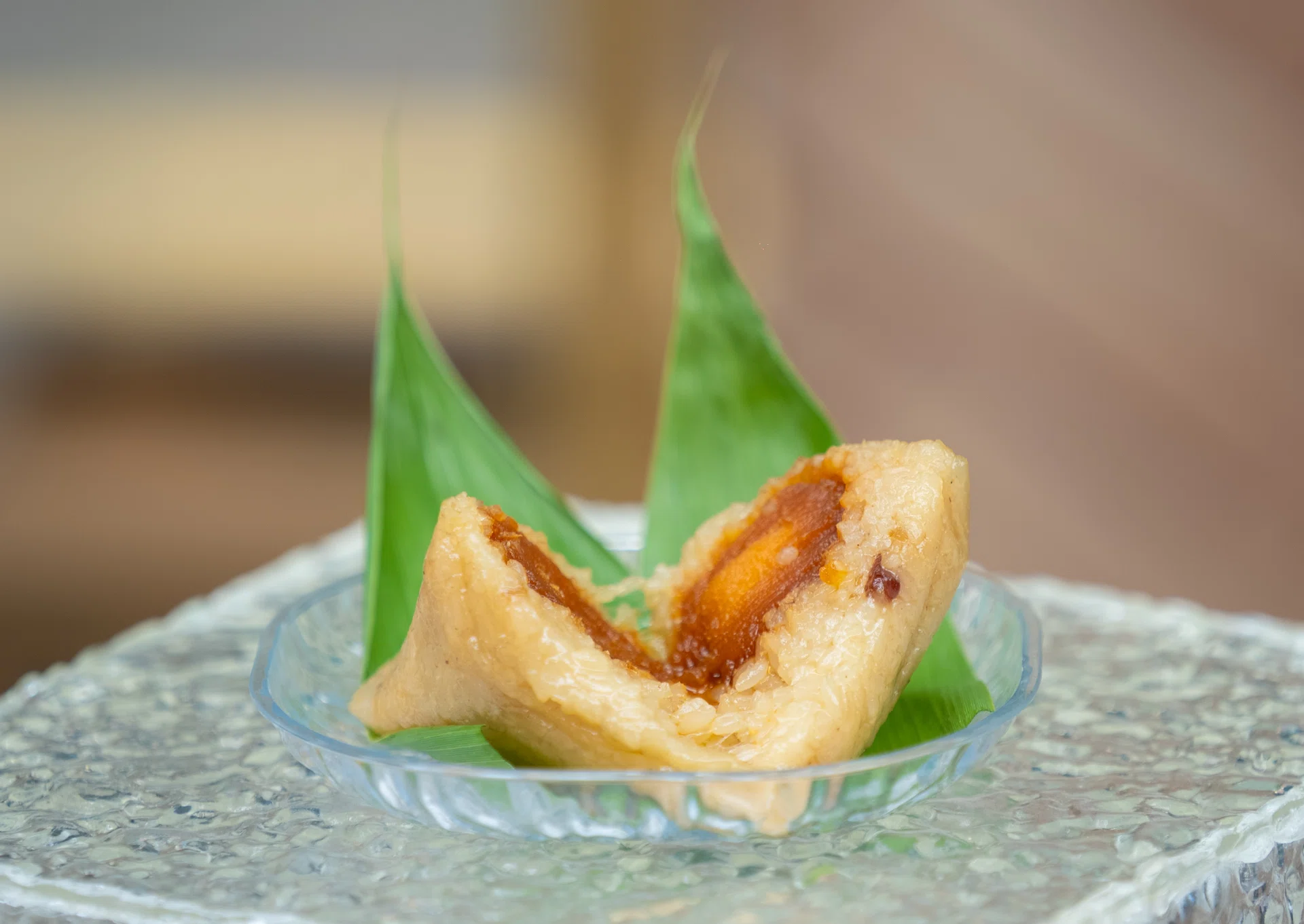 YIBIN, CHINA - JUNE 02: Zongzi, pyramid-shaped sticky rice dumplings, is made ahead of the Dragon Boat Festival on June 2, 2026 in Yibin, Sichuan Province of China. Celebrated on the fifth day of the fifth month of the Chinese lunar calendar, the Dragon Boat Festival falls on June 19 this year. (Photo by Luo Ping/VCG via Getty Images)