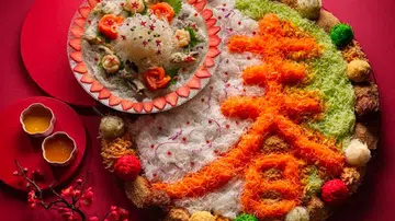 For diners who want a hands-off experience, staff at Man Fu Yuan at the Intercontinental Singapore can toss the yusheng, plate it and then serve