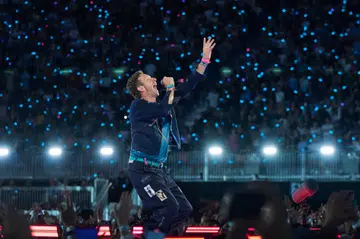 TORONTO, ONTARIO - JULY 07: Chris Martin of Coldplay performs at Rogers Stadium on July 07, 2025 in Toronto, Ontario. (Photo by Robert Okine/Getty Images)