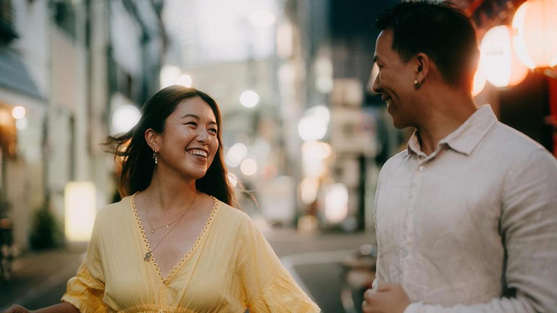 couple holding hands smiling | Year of the Fire Horse your 2026 CNY relationship forecast