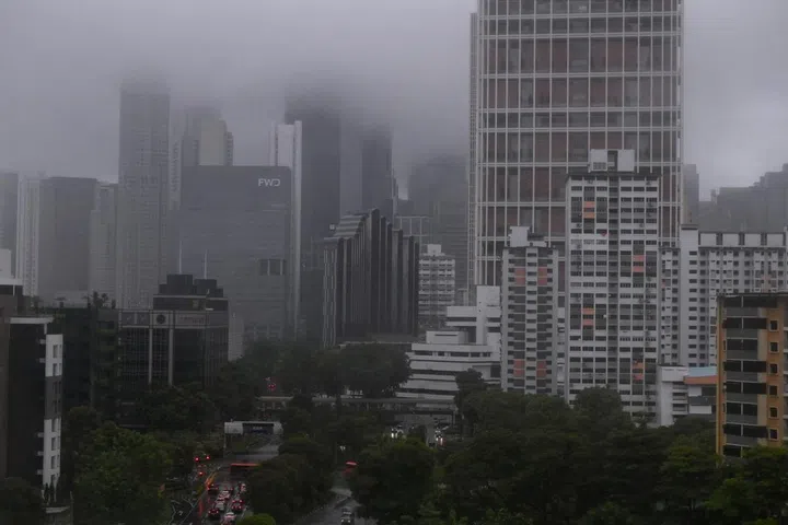 The Central Business District shrouded in low lying clouds on Aug 20, 2021. ST PHOTO: KUA CHEE SIONG
