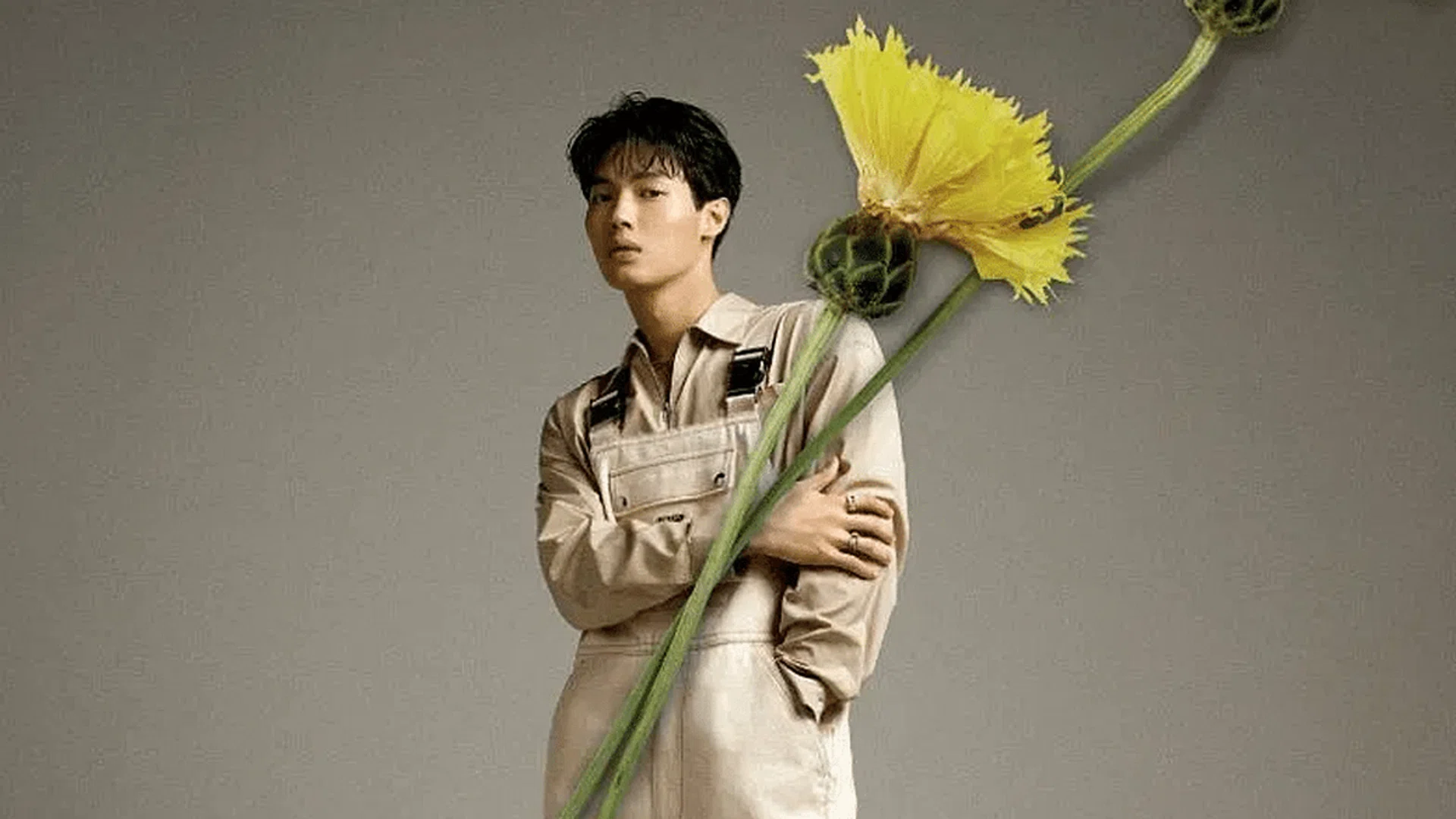 Shirt; overalls; boots, Prada. Necklace; rings, FRED. Photo: Zhang Minhua and Jeremy Kieran / Telescope Studios
