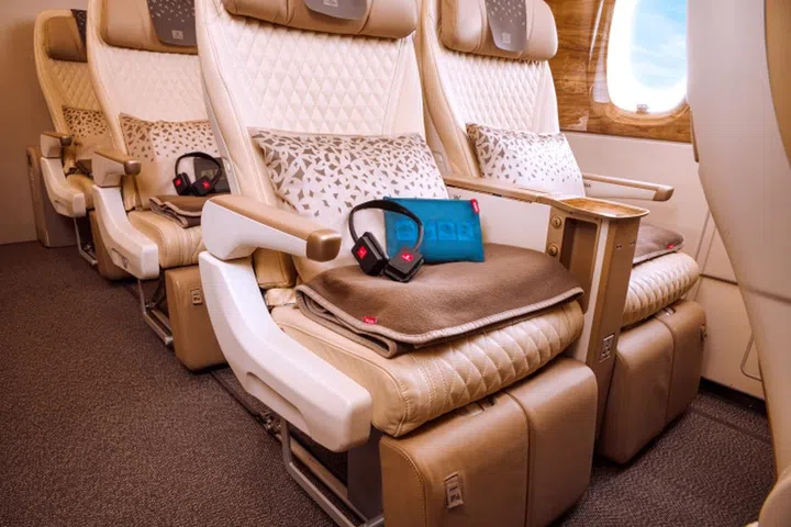 Cocoon yourself onboard with their sustainable blankets and generously-sized pillows. Credit: Emirates