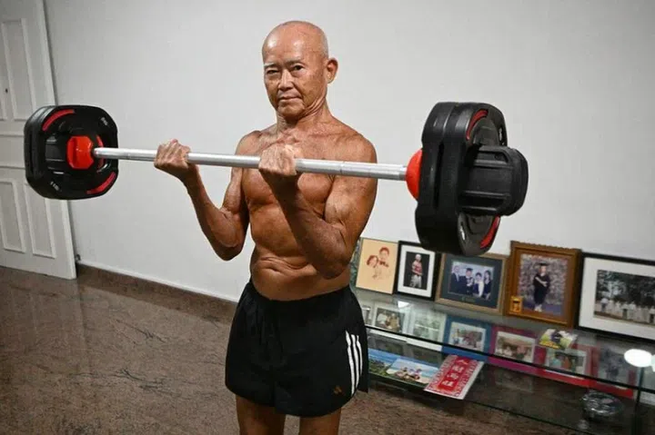 At his age, Mr Victor Chan, 70, is careful not to overload himself with too much weight.  ST PHOTO: ARIFFIN JAMAR