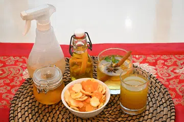 Story on how to turn your mandarin orange peels into syrups, tea, infused oils, and natural cleaners.