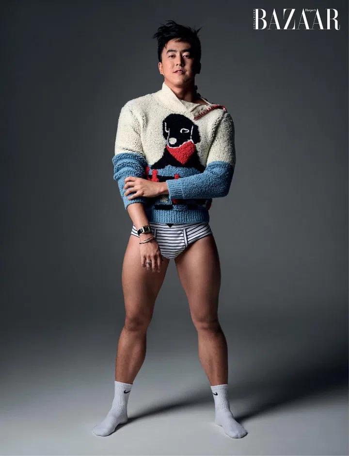 Sweater, Bottega Veneta. Trunks, Prada Socks, Nike. Watch; bracelet; rings, Cartier