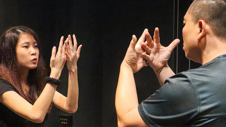 Claire works with her mentor and Art:Dis's Head of Artistic Direction (Performing Arts), Peter Sau, to refine gestures and movements for a monologue in Woman Flower