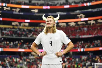 ARLINGTON, TEXAS - JUNE 30: (EDITOR'S NOTE: Tonal effects have been applied to this image) Erling Haaland #9 of Norway wears a viking helmet following their 2-1 win during the FIFA World Cup 2026 Round Of 32 match between Cote d'Ivoire and Norway at Dallas Stadium on June 30, 2026 in Arlington, Texas. (Photo by Julian Finney - FIFA/FIFA via Getty Images)